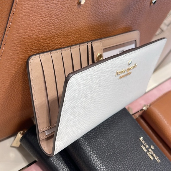 Kate Spade Madison Large Slim Bifold Wallet
Meringue 
NWT - Picture 10 of 16